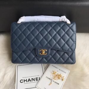 Chanel Flap Bag Navy Gold in Jumbo