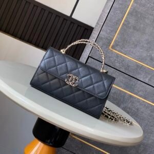 Chanel Kelly Clutch in Black Gold