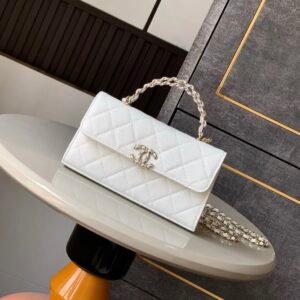 Chanel Kelly Clutch in White Gold