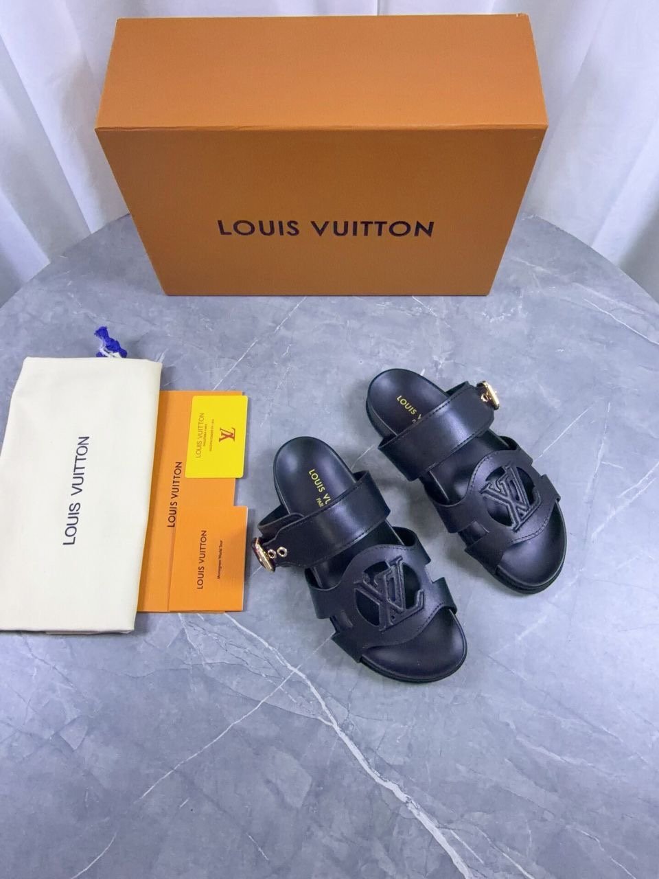 Louis Vuitton Sandals in Black Gold