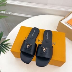 Louis Vuitton Sandals in Black Gold