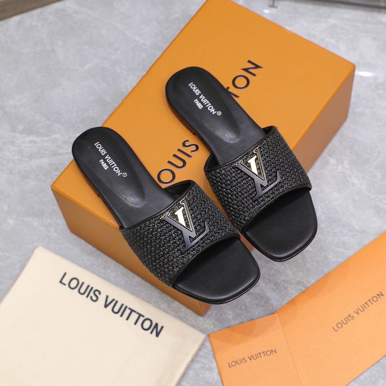 Louis Vuitton Sandals in Black Gold