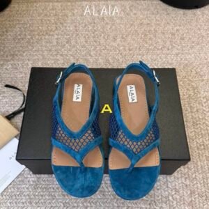 Alaia Fishnet Thong Sandals in Blue