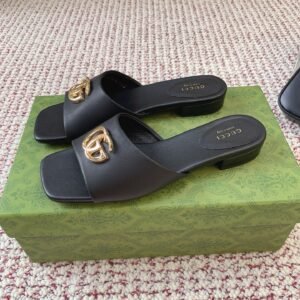Gucci GG Sandals in Black Gold