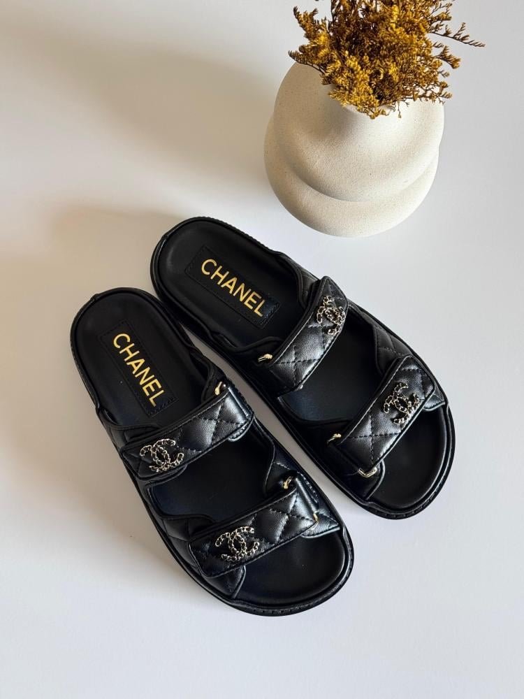 Chanel Sandals in Black Gold