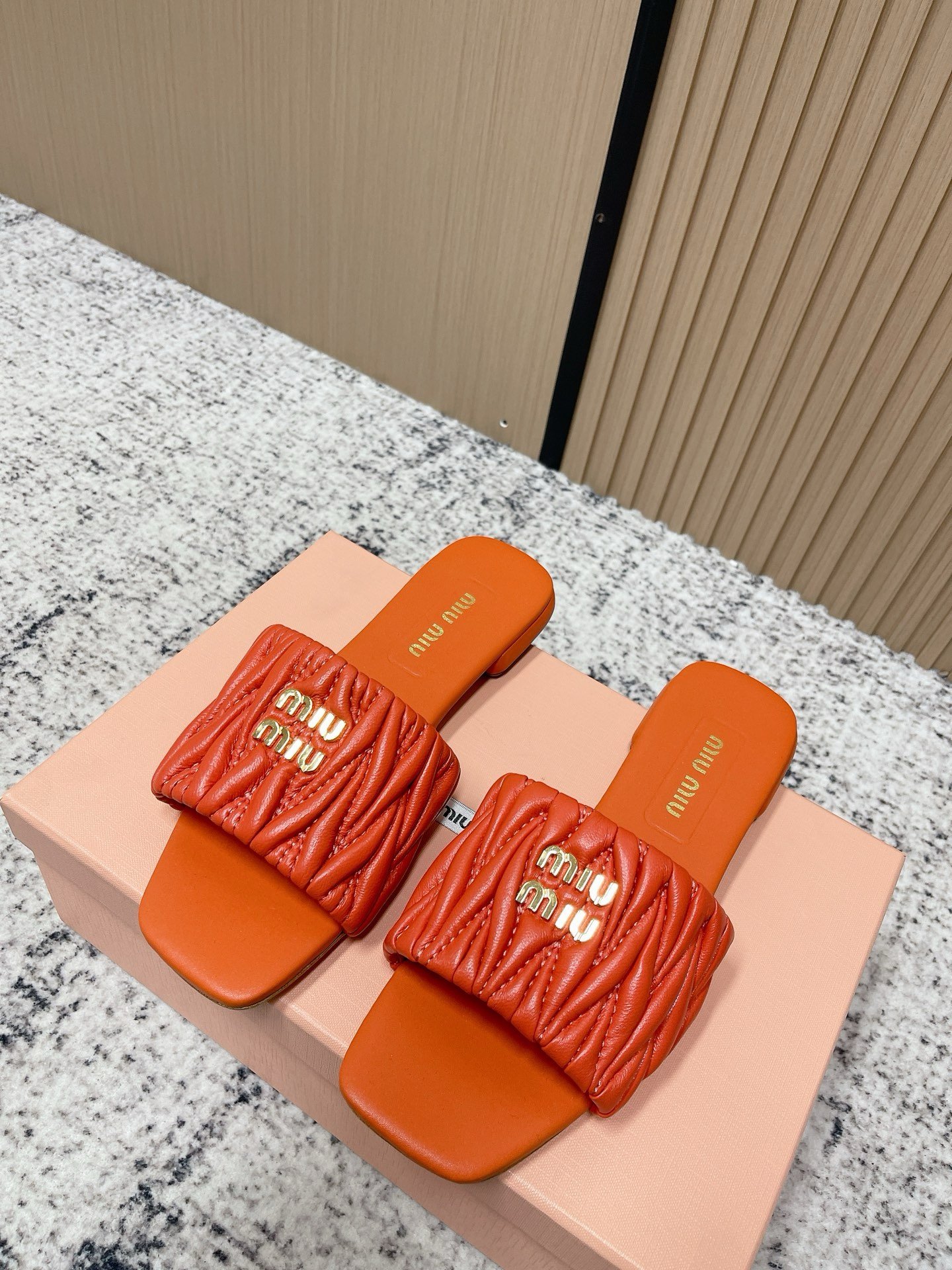 Miu Miu Slide Sandals in Orange
