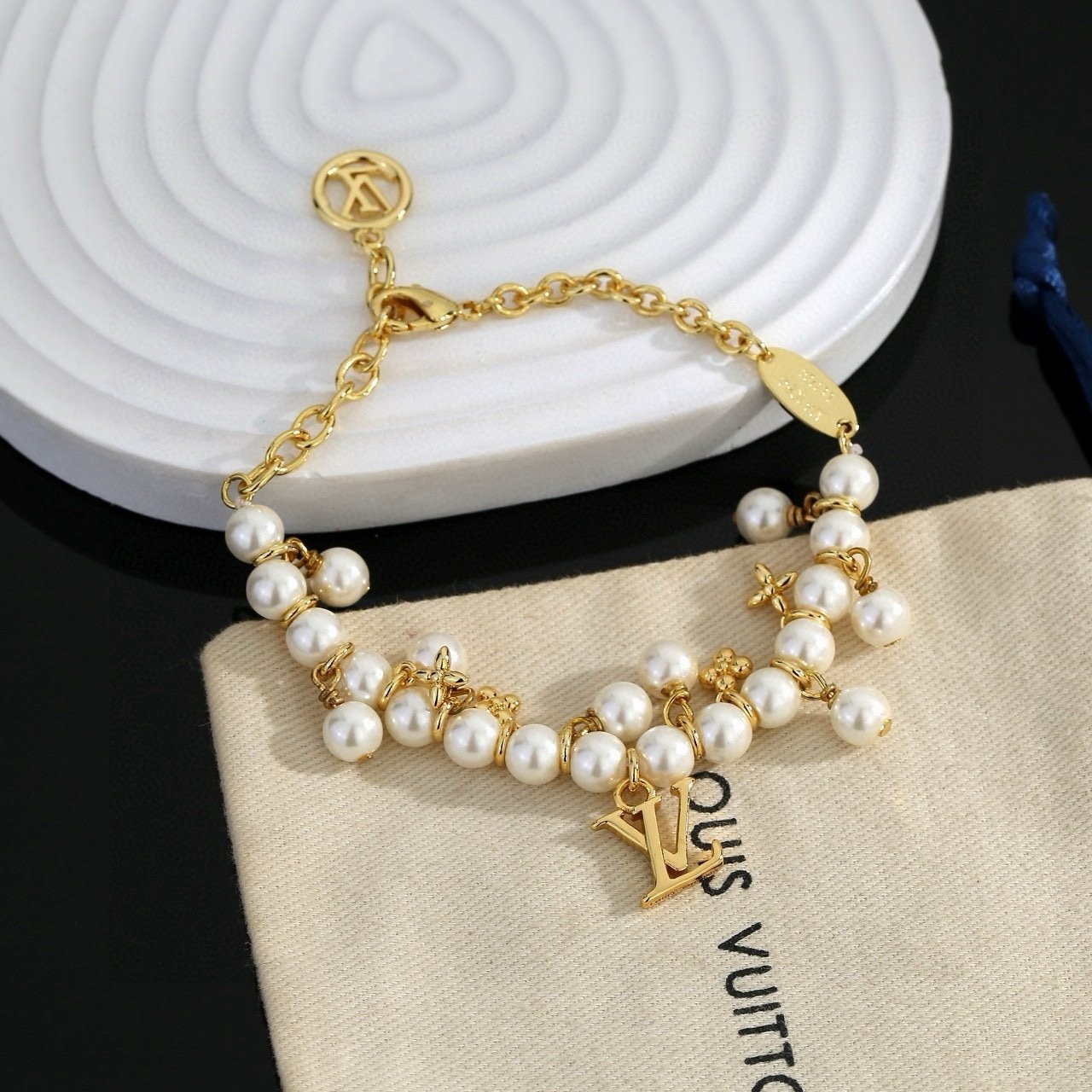 Louis Vuitton Pearl Bracelet in Gold
