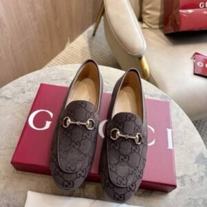 Gucci Jordaan Loafers in Brown and Gold